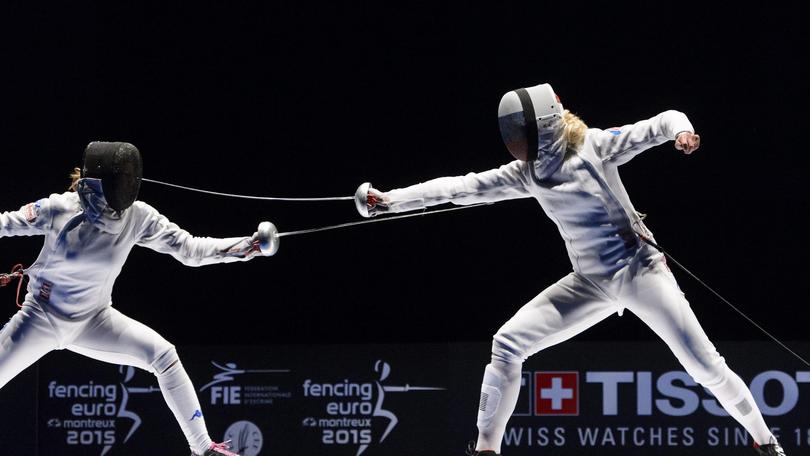 epa04786586 Rossella Fiamingo (L) of Italy competes against Violetta Kolobova of Russia during the Women's individual epee final at the European Fencing Championships in Montreux, Switzerland, 06 June 2015. EPA/JEAN-CHRISTOPHE BOTT